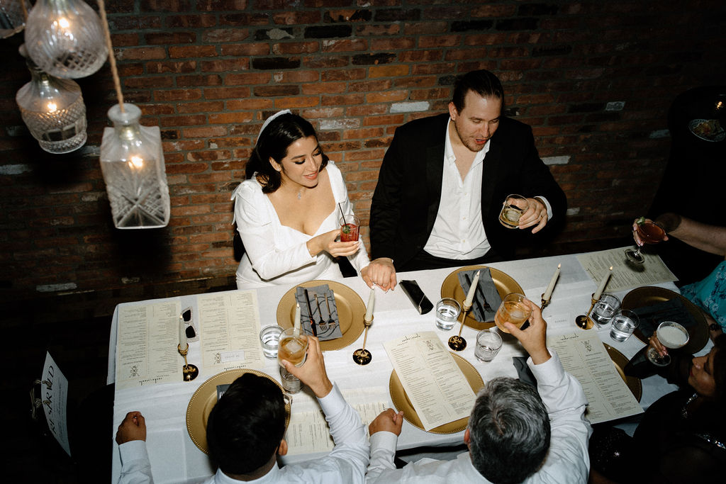 Newly eloped ouple have dinner at le meridien in indianapolis