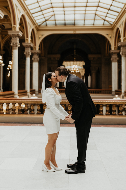 bride and groom posing for elopement photos