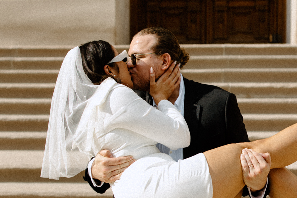 couple kissing after courthouse elopement in indiana