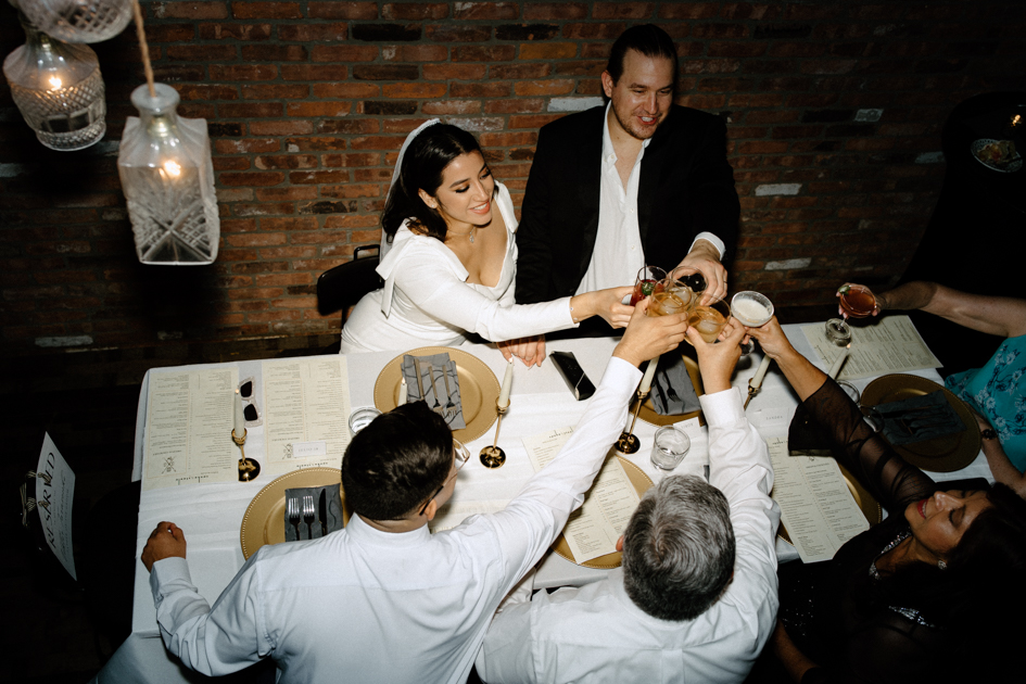 Newly eloped ouple have dinner at le meridien in indianapolis