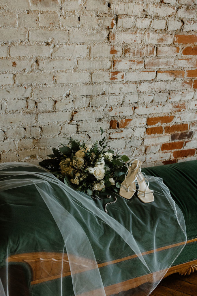 sage green and white color schemes wedding details