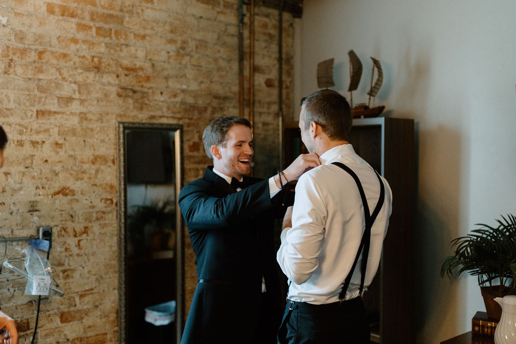 Groom getting ready before Indiana wedding ceremony at Bread and Chocolate wedding venue 