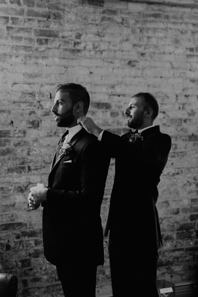 Groom getting ready before Indiana wedding ceremony at Bread and Chocolate wedding venue 