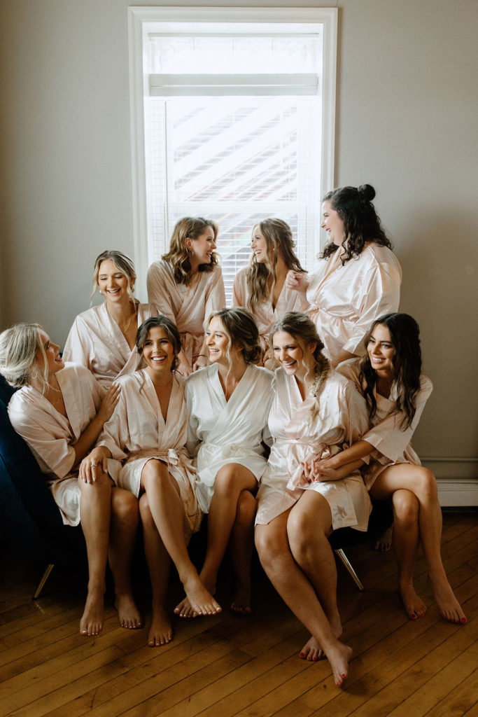 Bride and bridesmaids in robes before ceremony