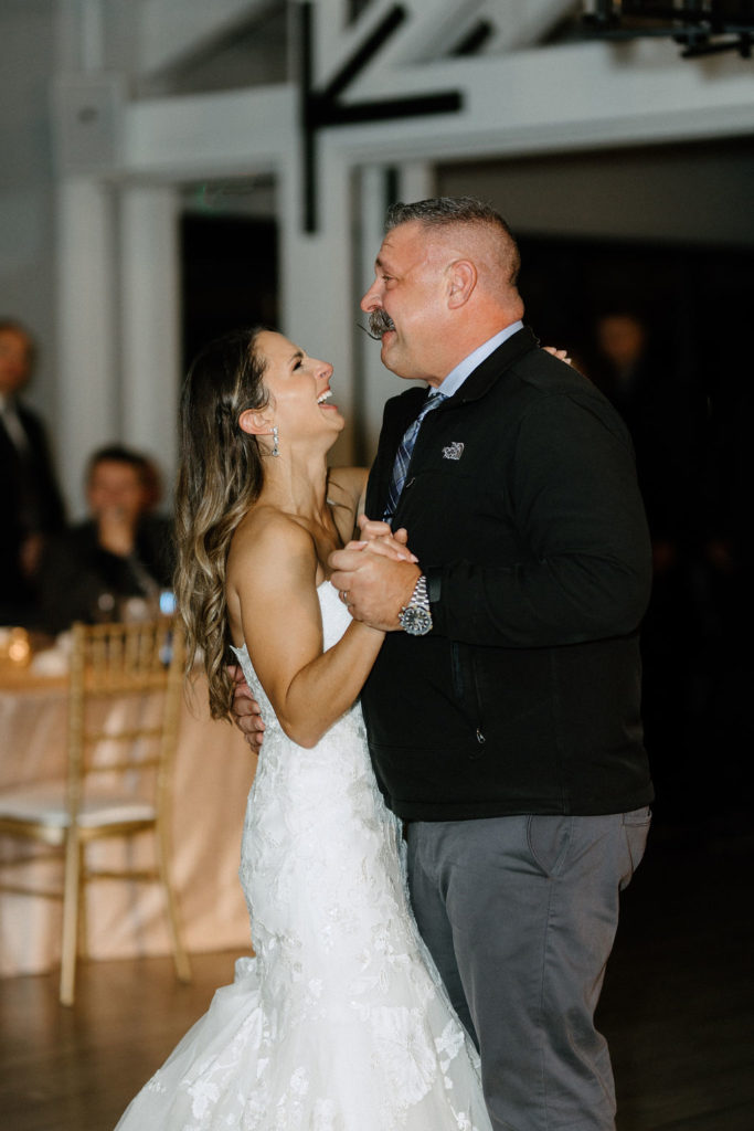 bride dancing with family