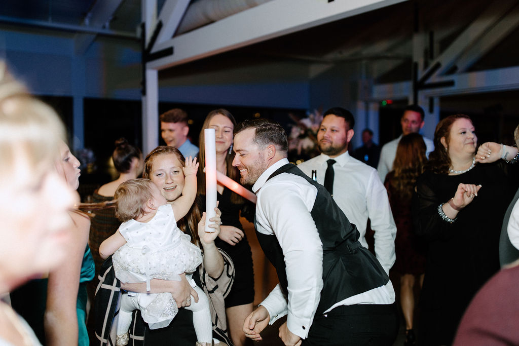 wedding guests dancing at Indiana wedding reception before wedding exit