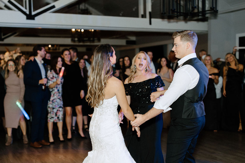 wedding guests dancing at Indiana wedding reception before wedding exit