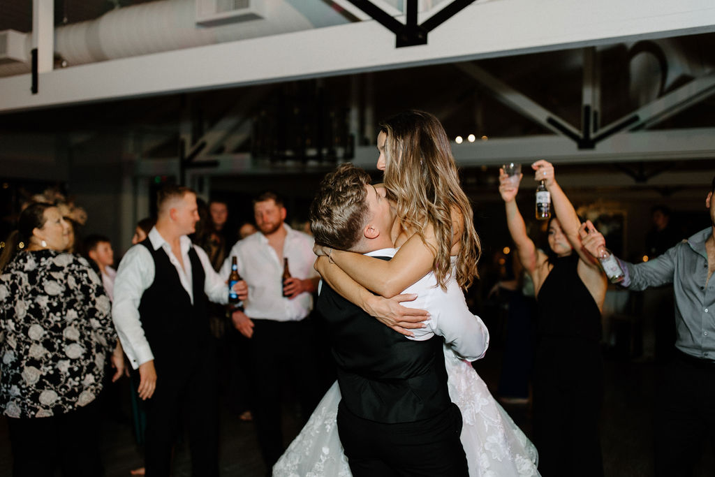 wedding guests dancing at Indiana wedding reception before wedding exit