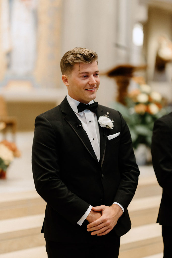 groom crying after seeing his bride