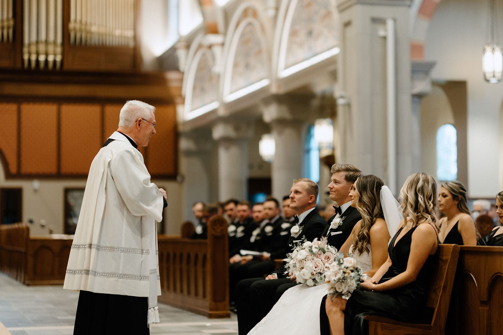 bride and groom at the altar