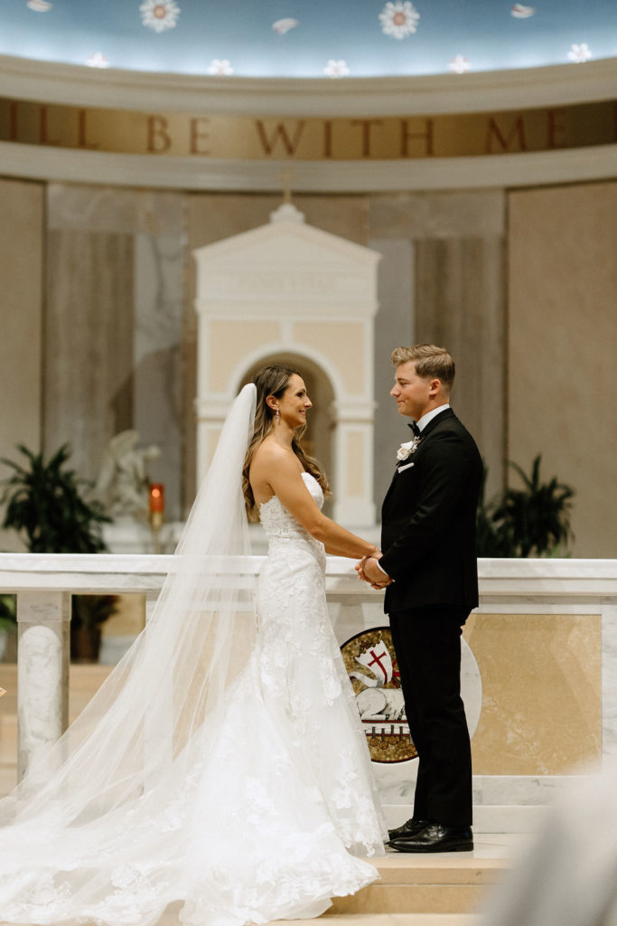 bride and groom at the altar