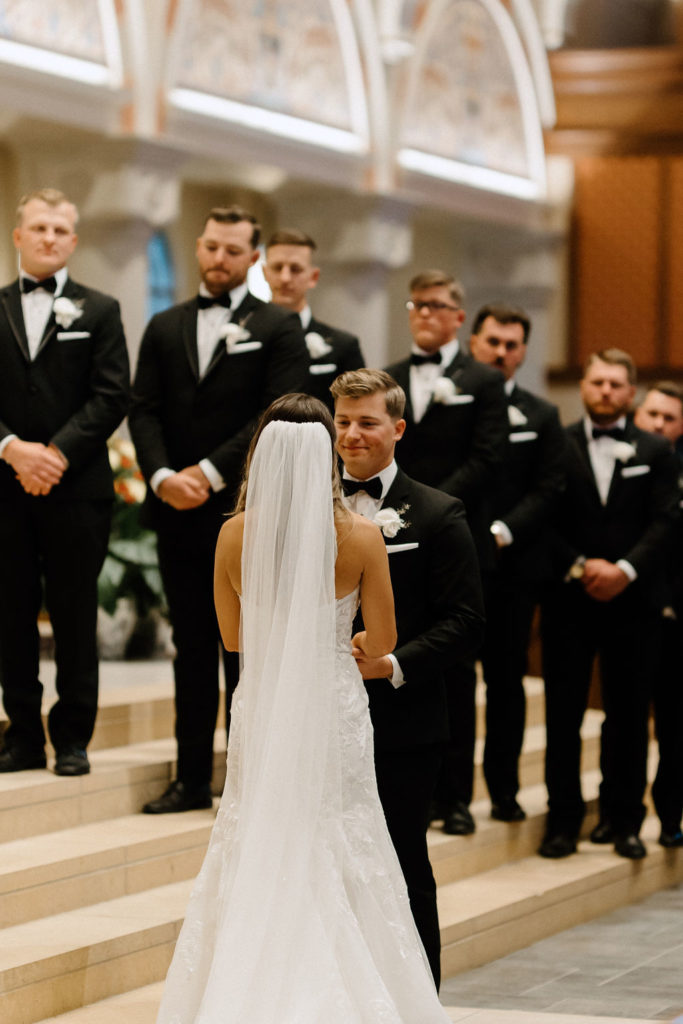 bride and groom at the altar