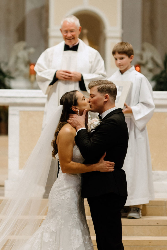 bride and groom at the altar