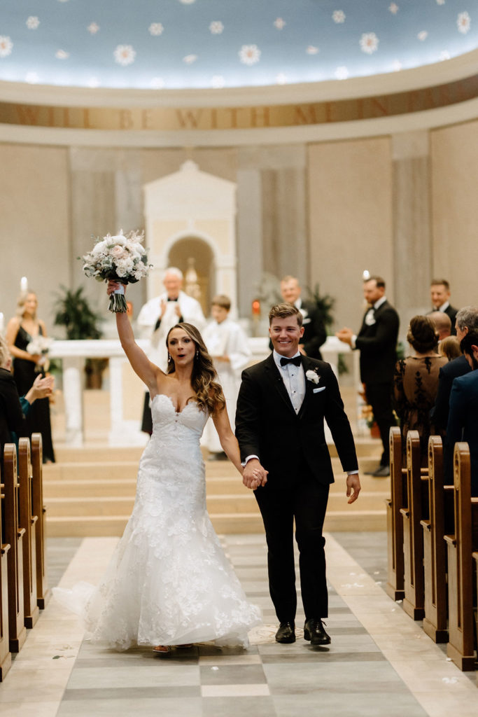 bride and groom at the altar