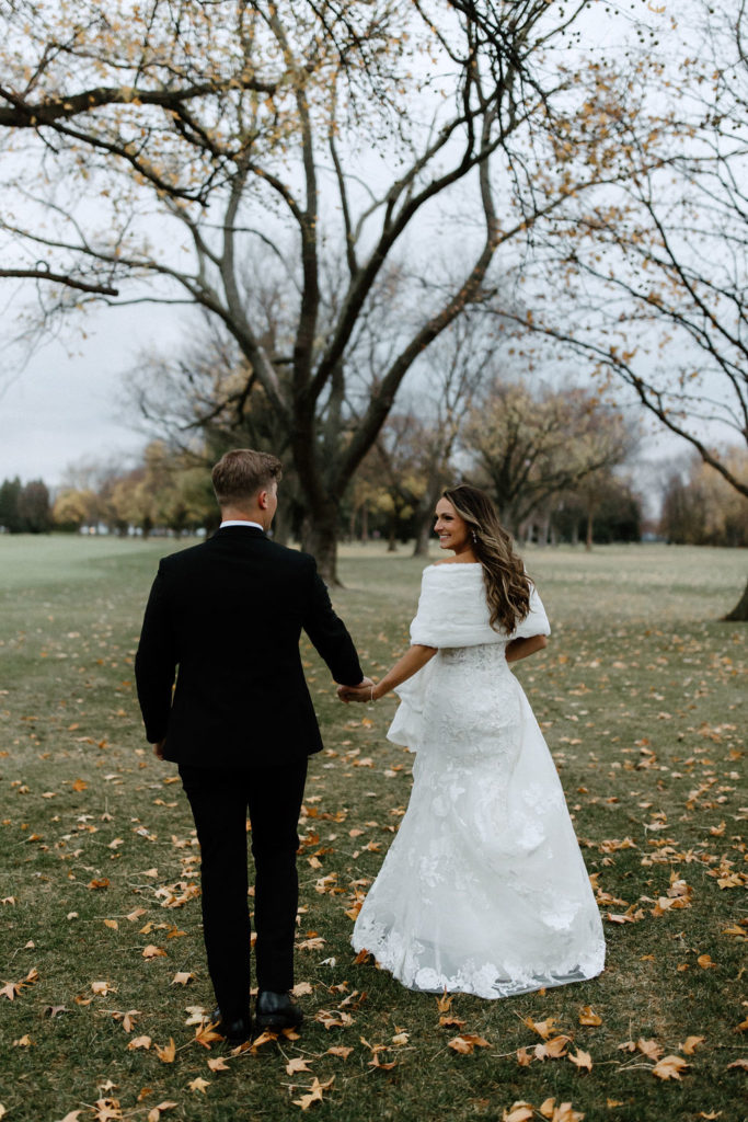 Bride and groom wedding portraits after Indiana wedding after wedding exit