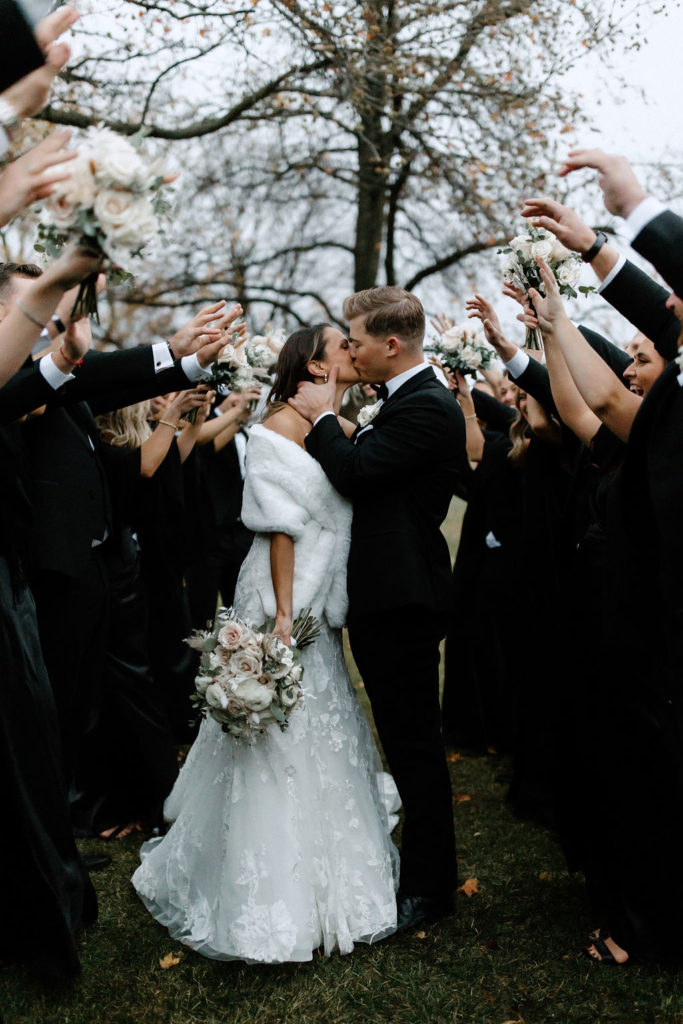 Bride and groom wedding portraits after Indiana wedding after wedding exit