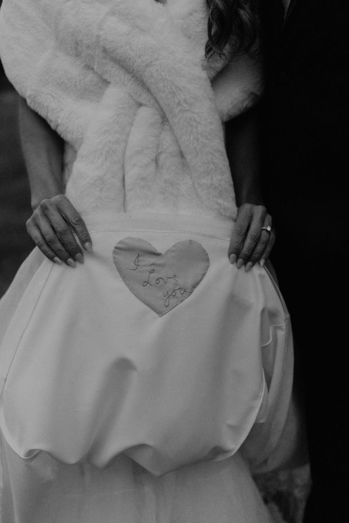 wedding dress with stitched i love you