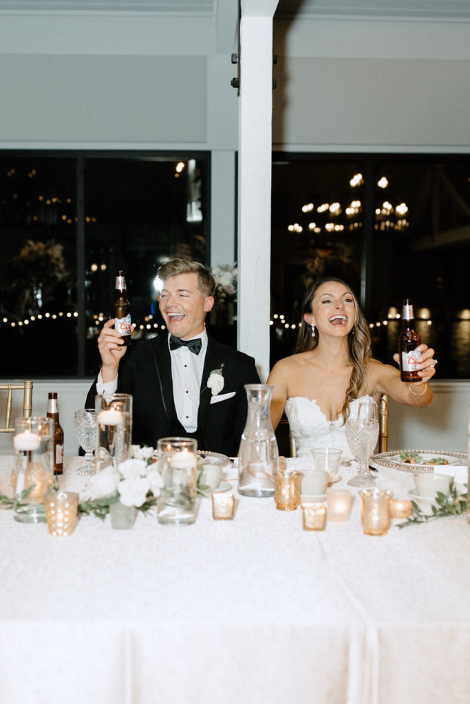 bride and groom toasting