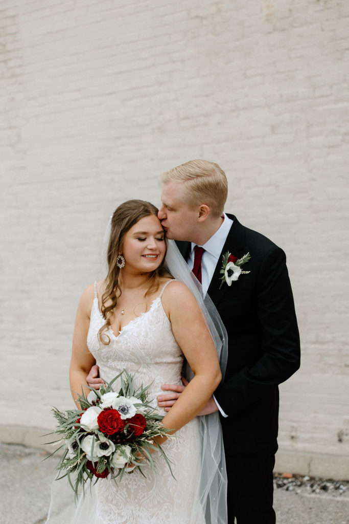 Bride and groom winter wedding portraits at The Hobson in Kokomo Indiana wedding venue