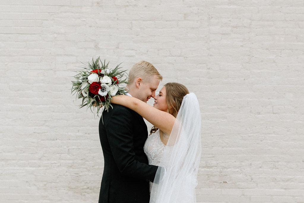 Bride and groom winter wedding portraits at The Hobson in Kokomo Indiana wedding venue