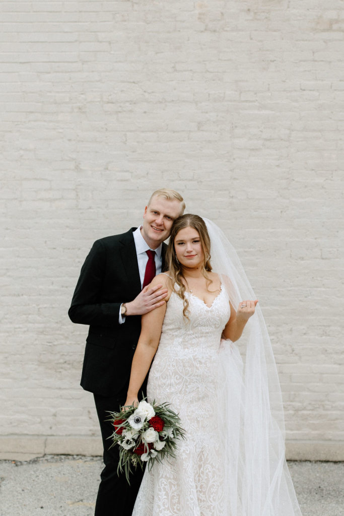 Bride and groom winter wedding portraits at The Hobson in Kokomo Indiana wedding venue