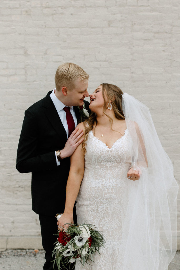 Bride and groom winter wedding portraits at The Hobson in Kokomo Indiana wedding venue