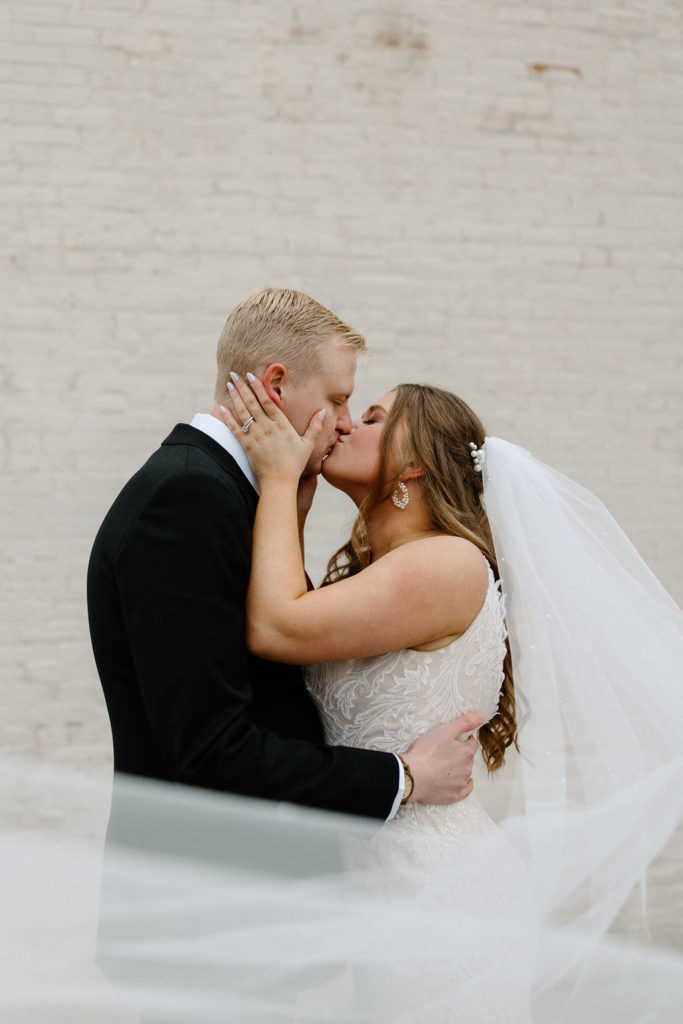 Bride and groom winter wedding portraits at The Hobson in Kokomo Indiana wedding venue