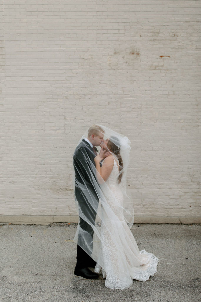 Bride and groom winter wedding portraits at The Hobson in Kokomo Indiana wedding venue