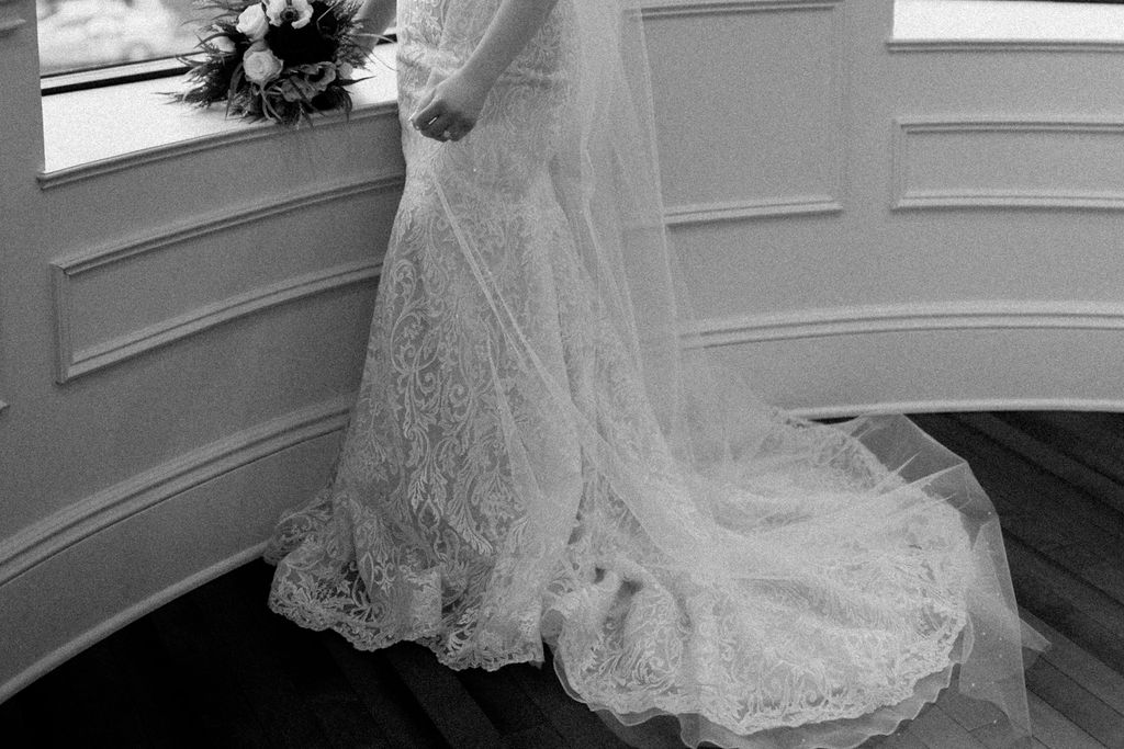 Bride getting dressed before wedding ceremony