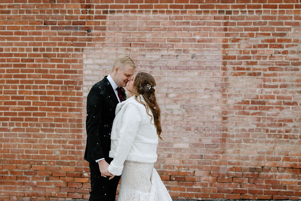 Bride and groom winter wedding portraits at The Hobson in Kokomo Indiana wedding venue