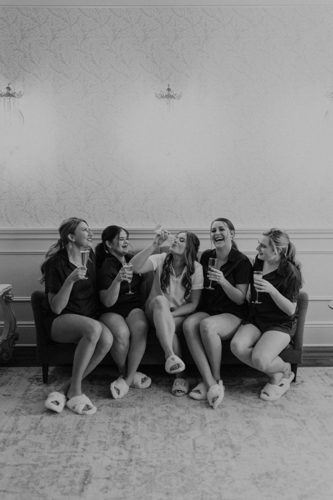 Bride and bridesmaids with champagne