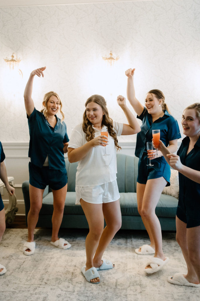 Bride and bridesmaids with champagne