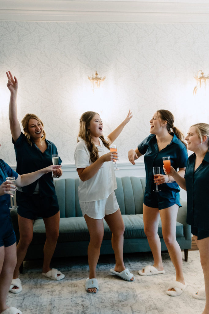 Bride and bridesmaids with champagne