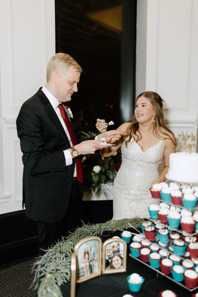 Bride and groom during cake cutting