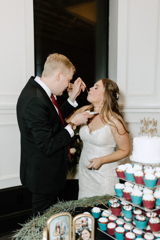 Bride and groom during cake cutting