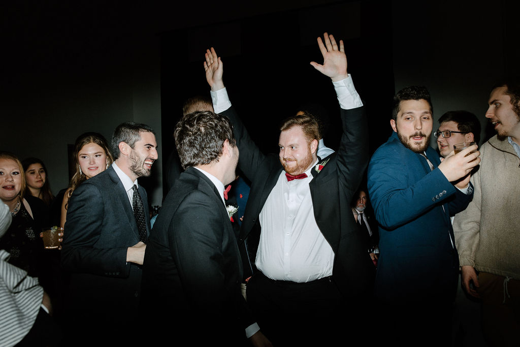 wedding guests dancing during reception