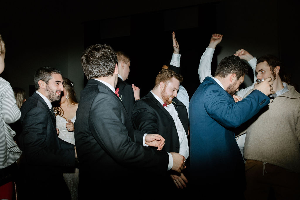 wedding guests dancing during reception