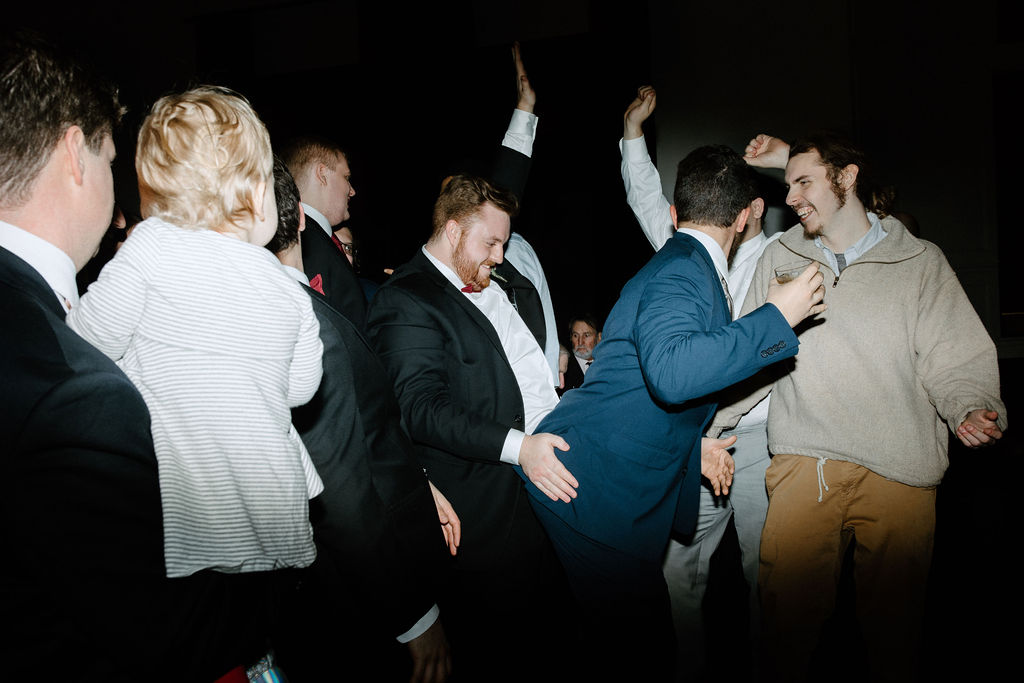 wedding guests dancing during reception