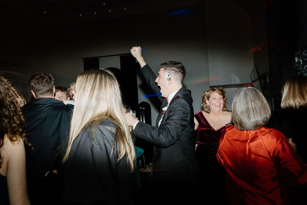 wedding guests dancing during reception