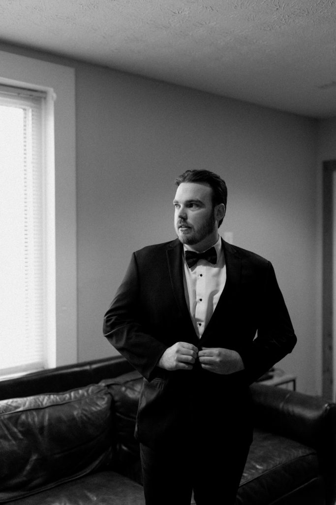 Groom getting ready for ceremony