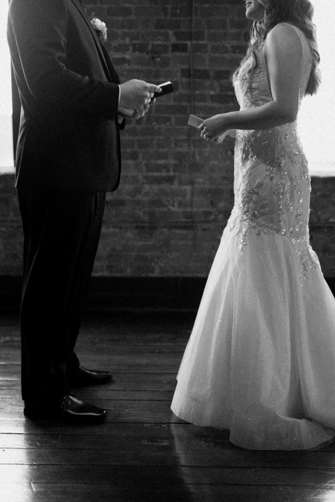 Bride and groom exchanging private vows