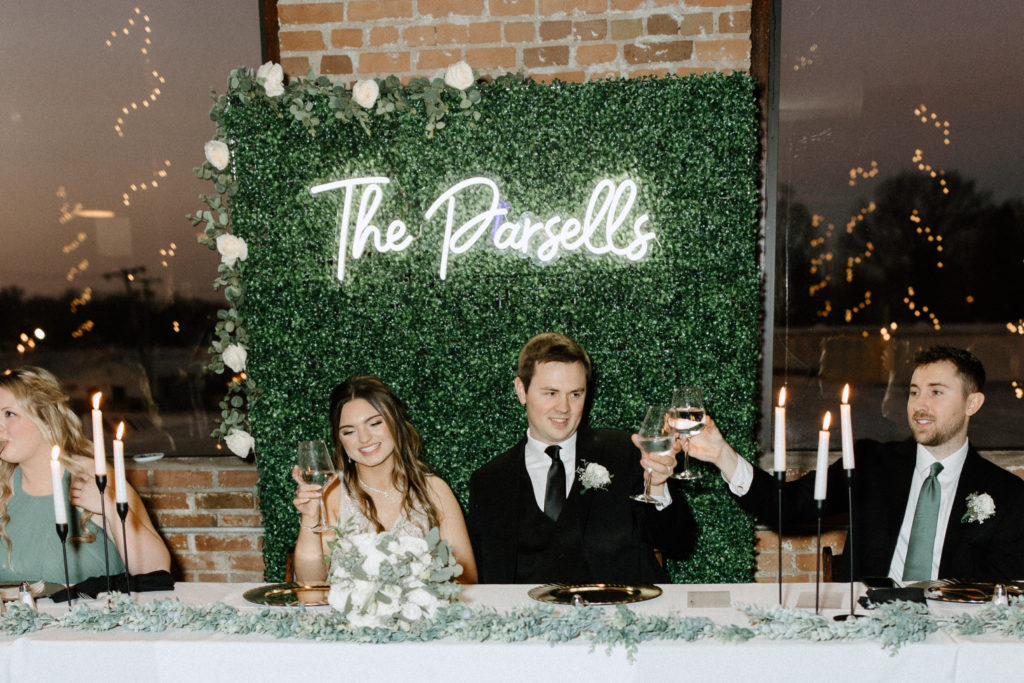 Bride and groom toasting