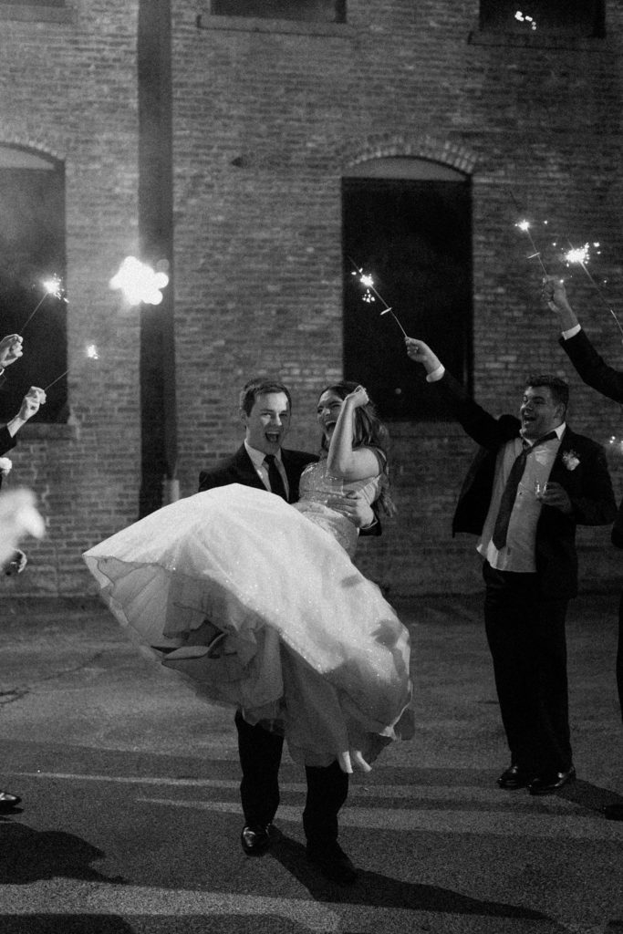 Bride and grooms sparkler wedding exit photographed by Brianna Dutcher Indianapolis wedding photographer