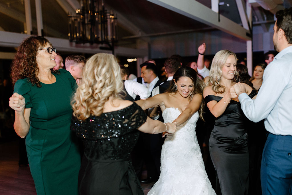 Wedding guests dancing during reception