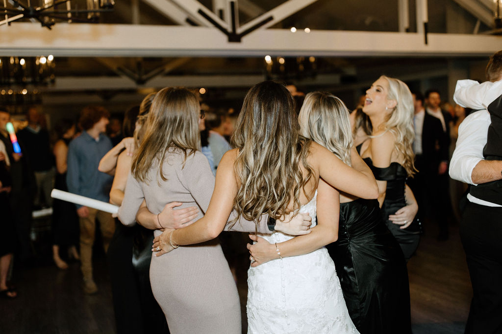 Wedding guests dancing during reception