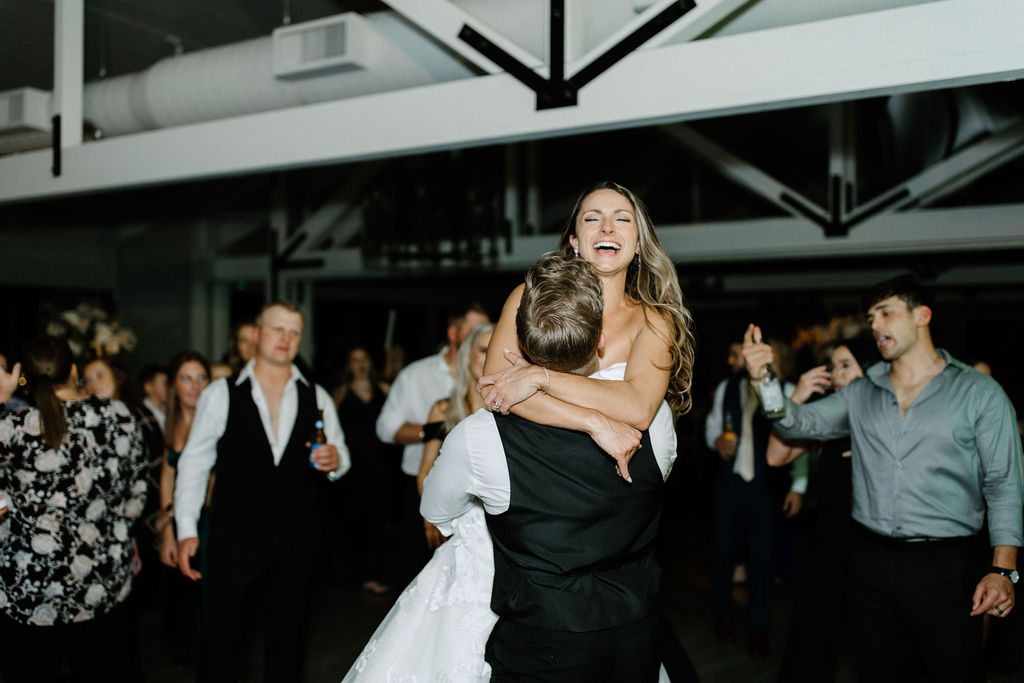 Bride and groom dancing during their reception