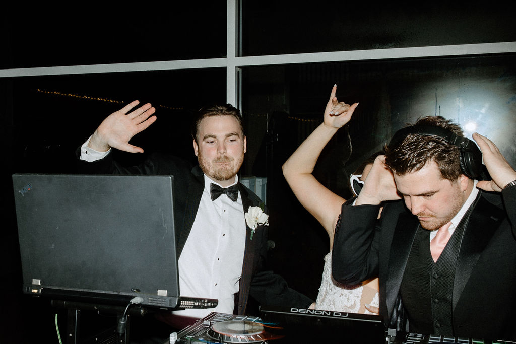 Groom at dj booth