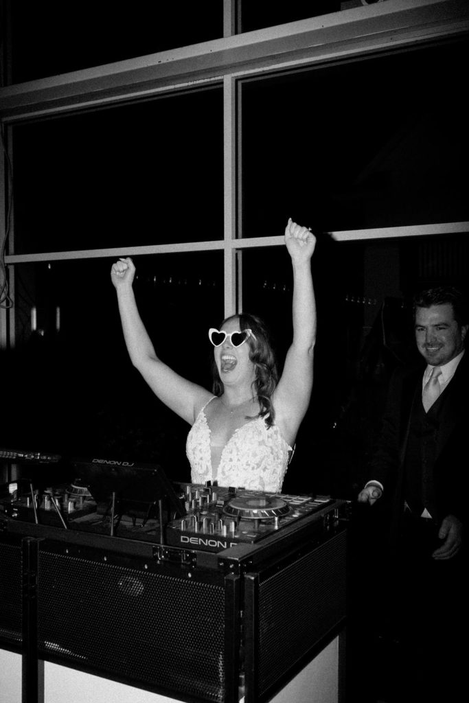 bride at dj booth