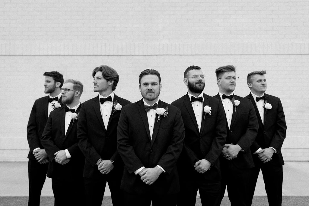 Groom and groomsman portraits in Carmel, Indiana