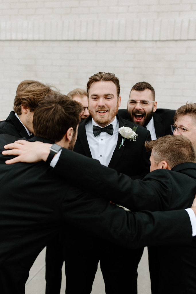 Groom and groomsman portraits in Carmel, Indiana